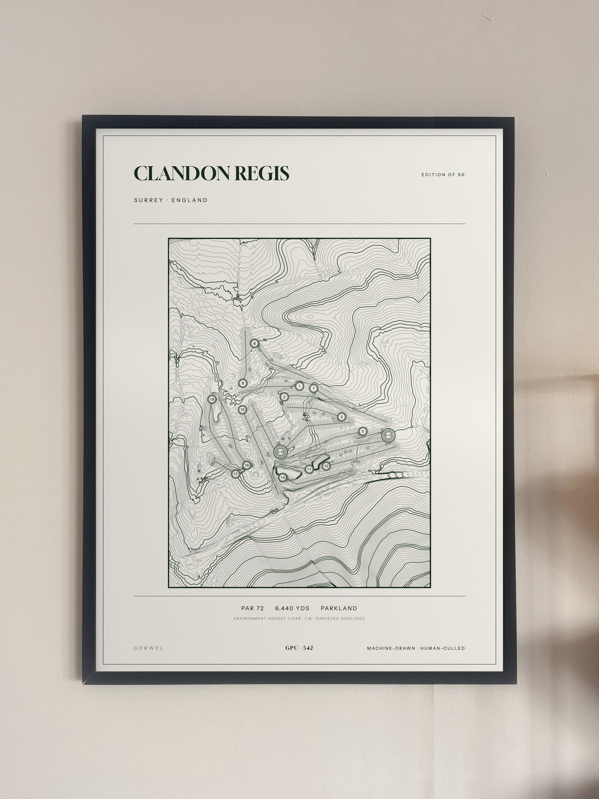 Clandon Regis, Surrey print, framed, on a wall