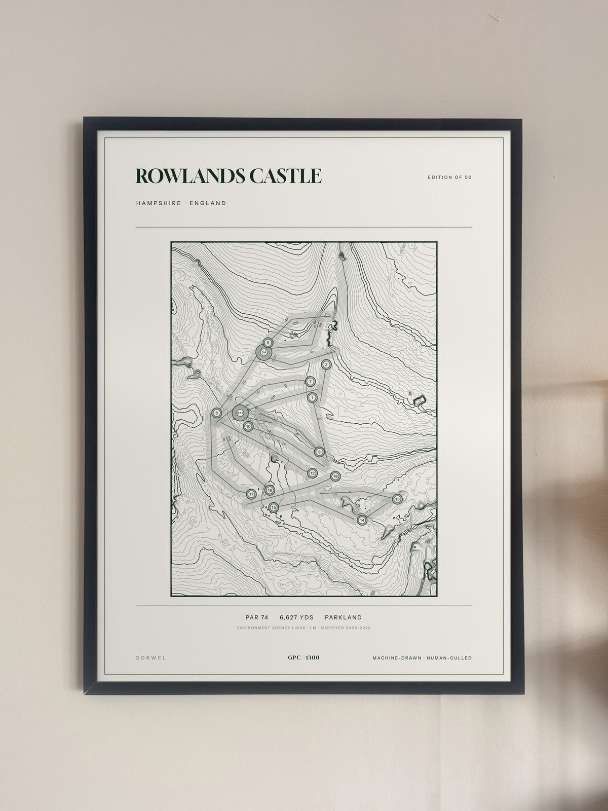 Rowlands Castle, Hampshire print, framed, on a wall