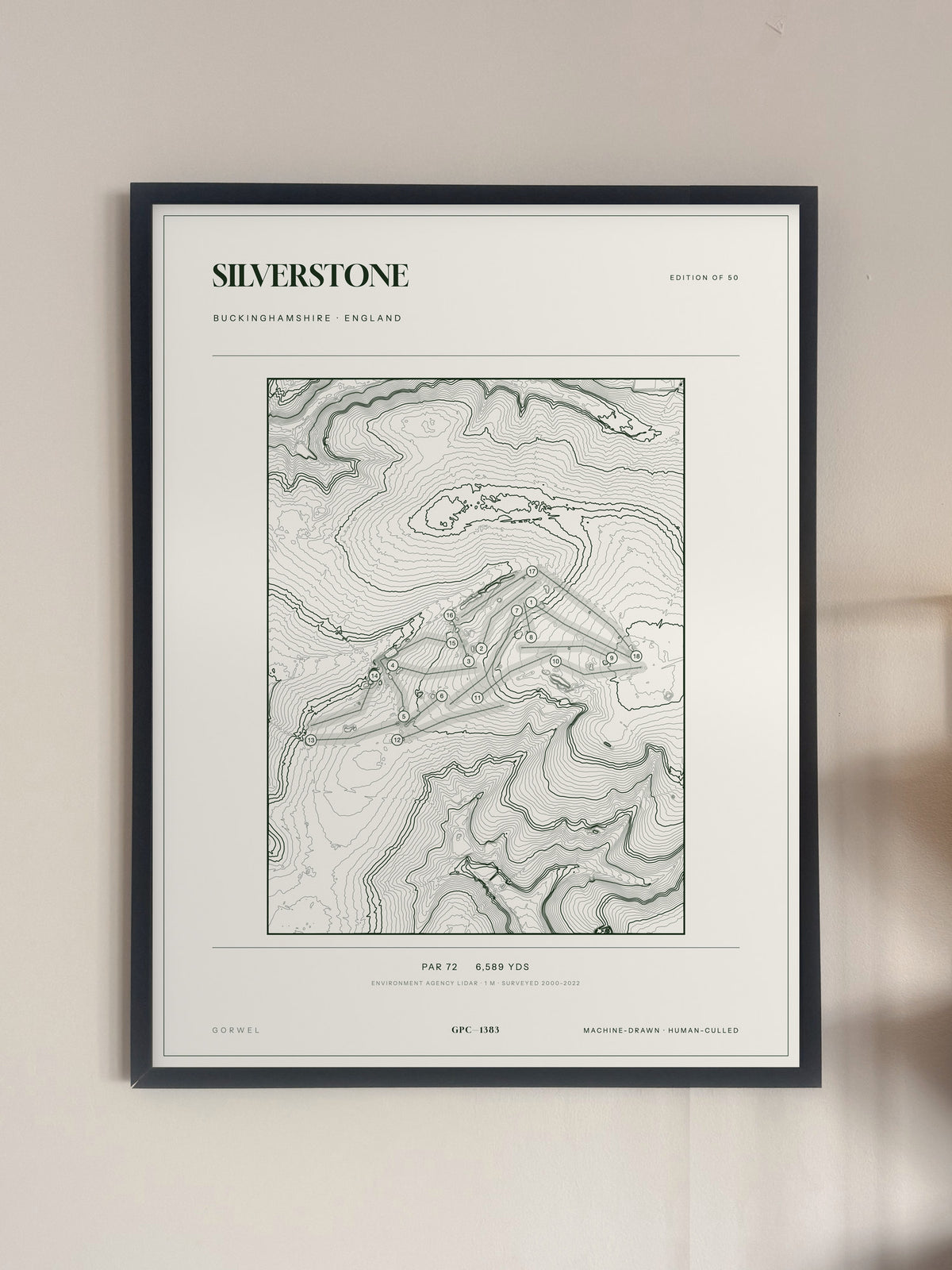 Silverstone, Buckinghamshire print, framed, on a wall